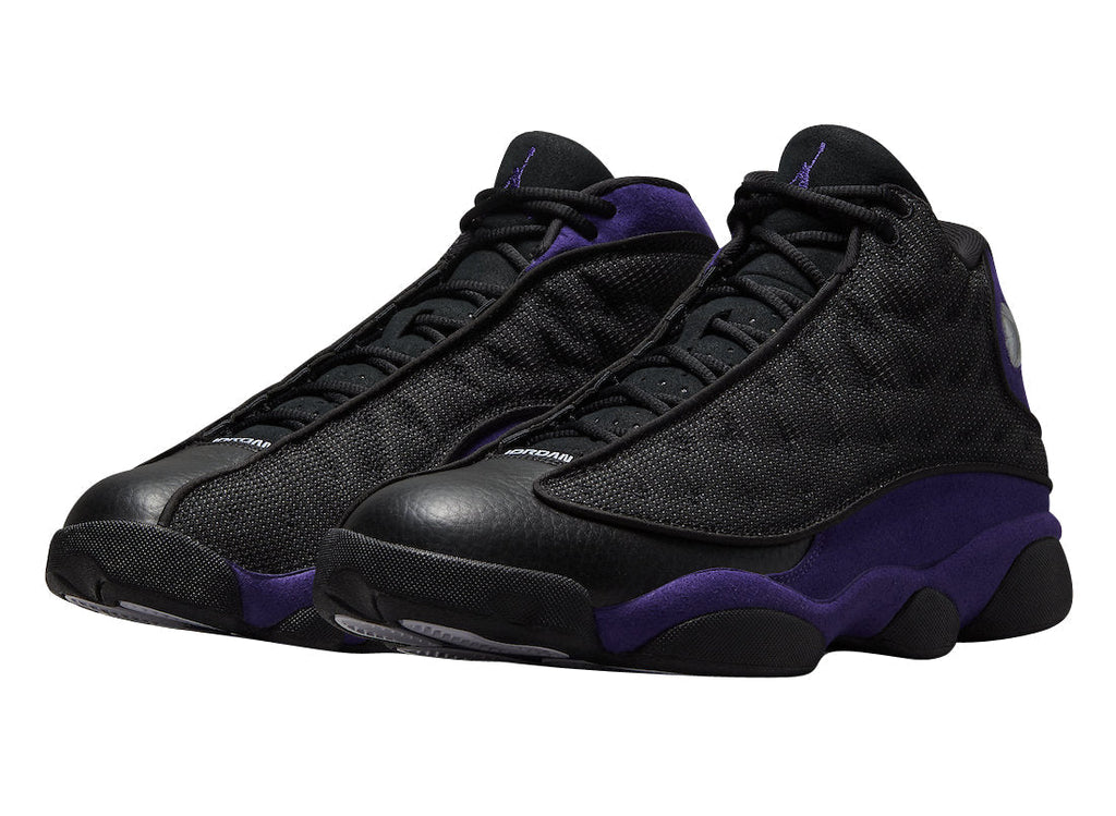 Jordan 13 in Black / Purple - product image from the listing.