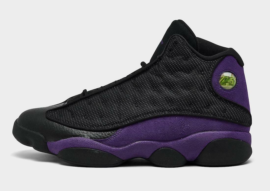 Jordan 13 in Black / Purple - product image from the listing.