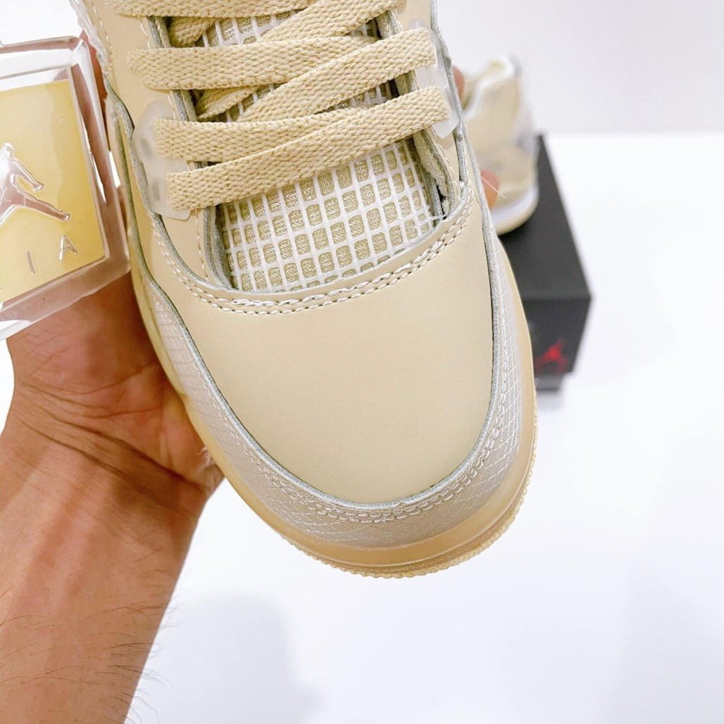 Women's Jordan 4 Retro Off-White Sail - product image from the listing.