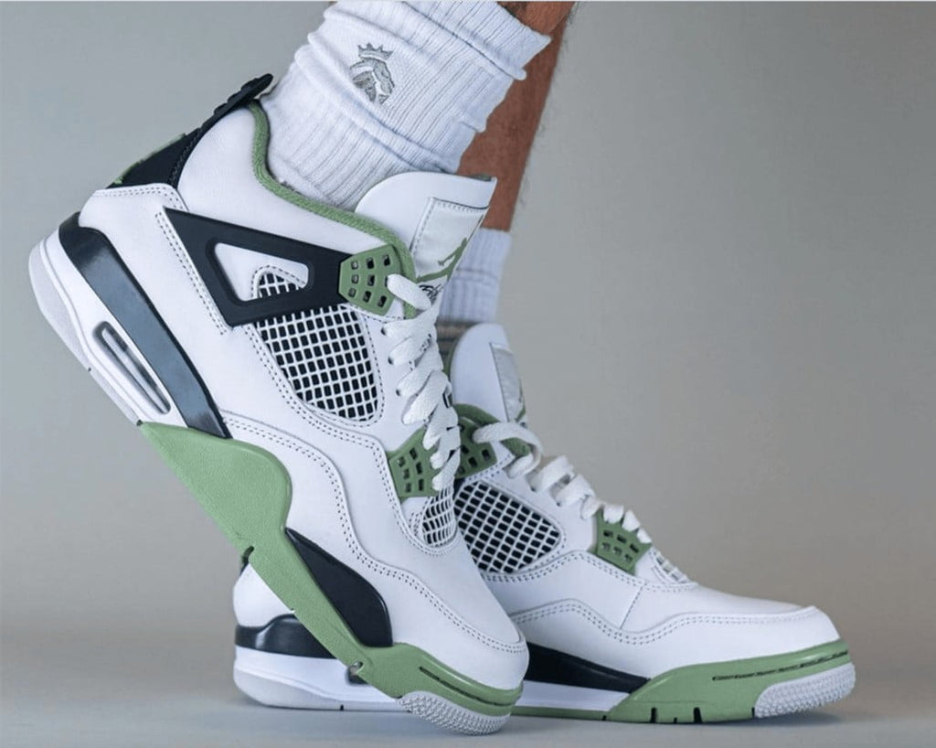 Women's Jordan 4 Retro Seafoam - product image from the listing.