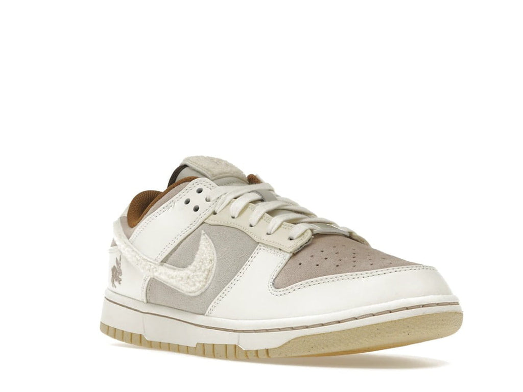 Dunk Low Retro PRM Year of the Rabbit Fossil Stone (2023) by Nike - product image from the listing.