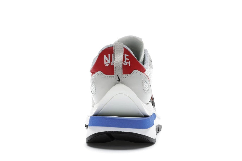 Nike Vaporwaffle sacai Sport Fuchsia Game in Royal - product image from the listing.