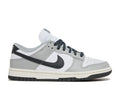 Nike Dunk Low 'Light Smoke Grey' Footwear - product image from the listing.