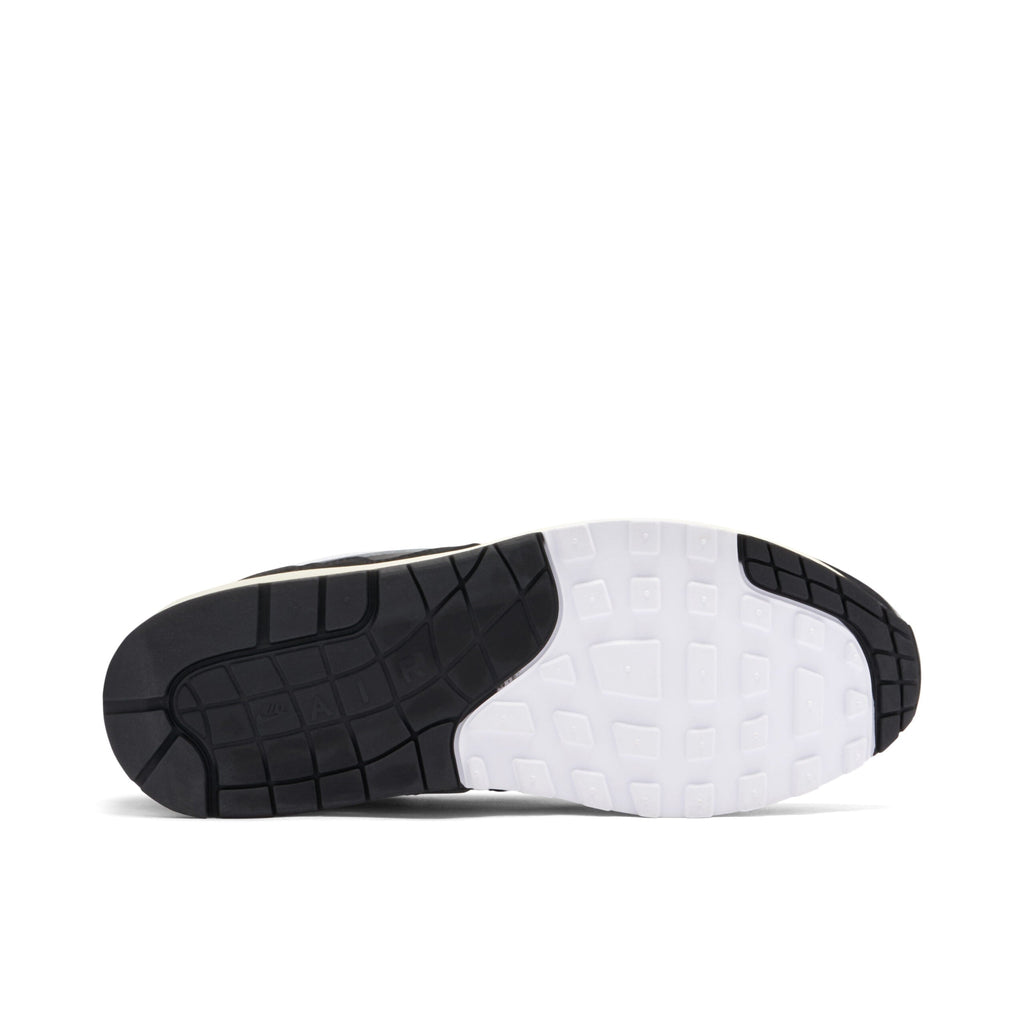 With Bracelet - Patta x Nike Air Max 1 Black White - product image from the listing.