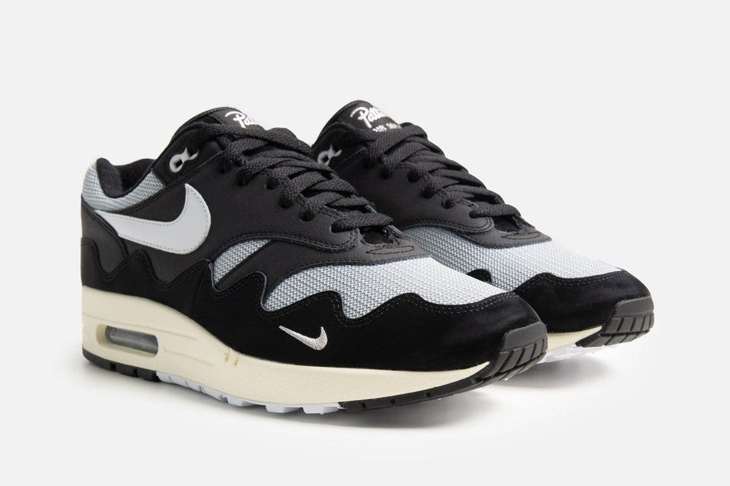 With Bracelet - Patta x Nike Air Max 1 Black White - product image from the listing.