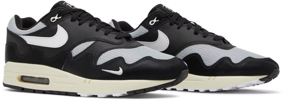 With Bracelet - Patta x Nike Air Max 1 Black White - product image from the listing.