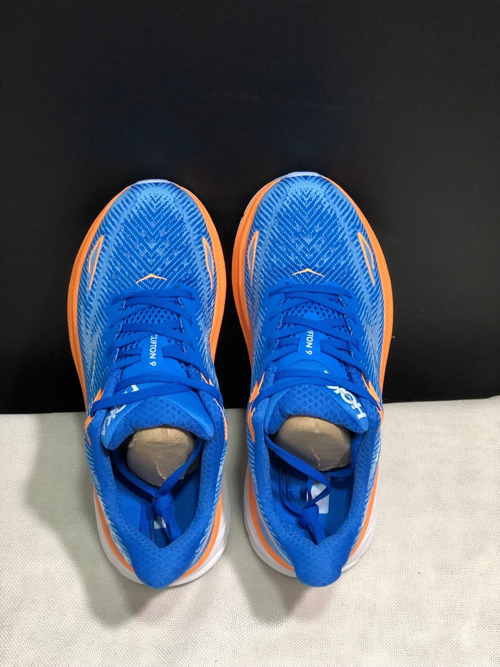 ONE ONE Clifton 9 by HOKA - product photo shown in the listing for this item.