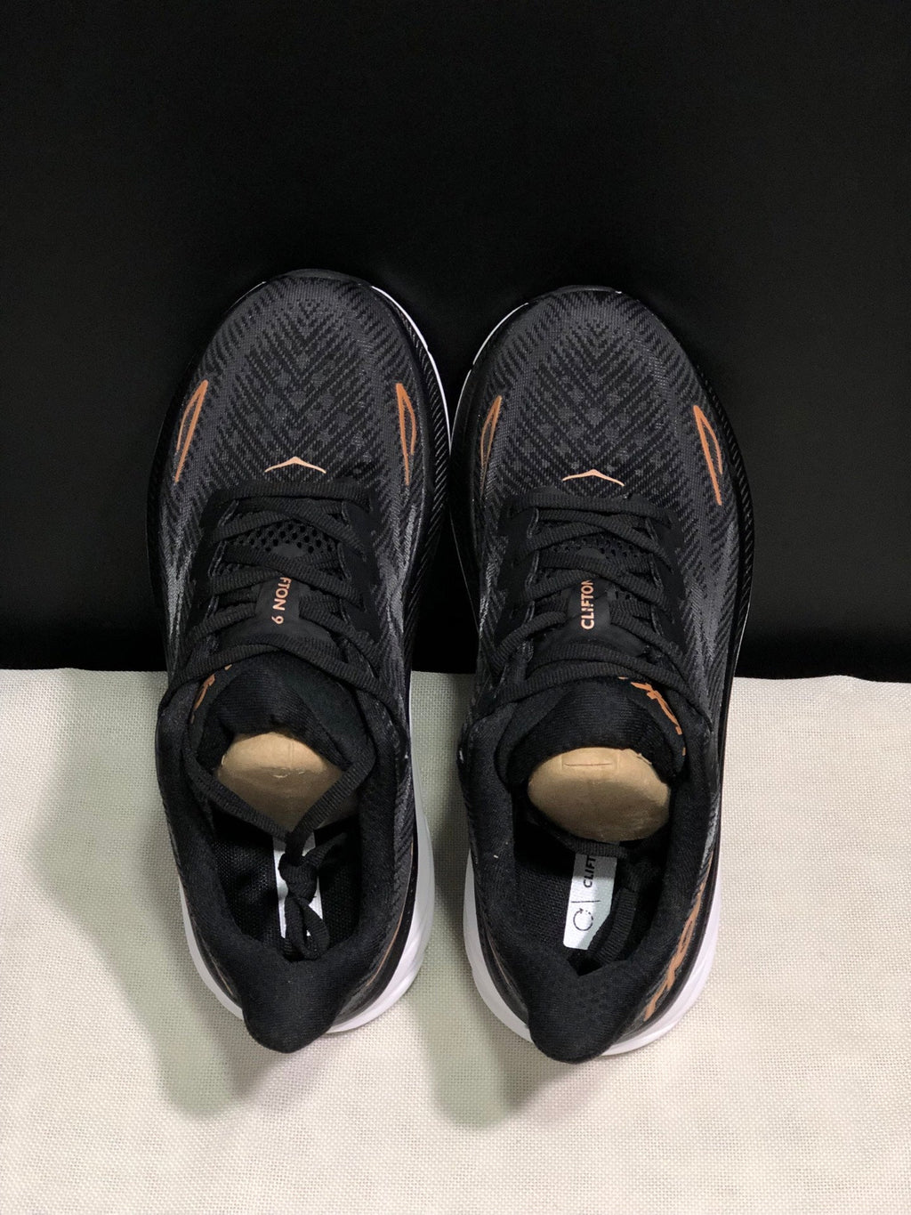 ONE ONE Clifton 9 by HOKA - product photo shown in the listing for this item.