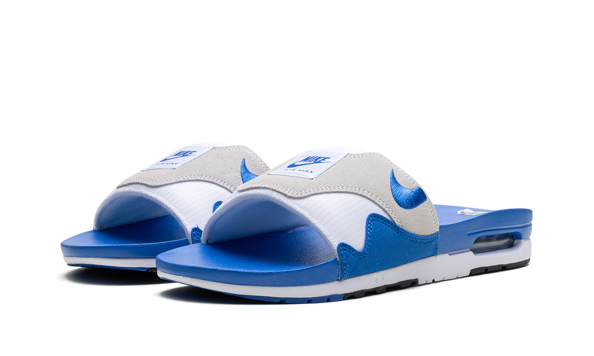 "Royal Blue" Nike Air Max 1 Slide FJ4007 100 - product image from the listing.